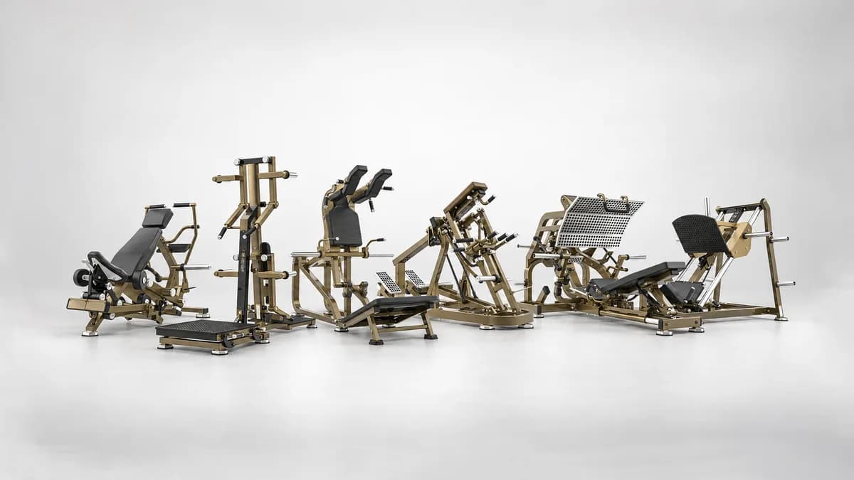 Row of RealleaderUSA plate loaded machines on a commercial gym floor